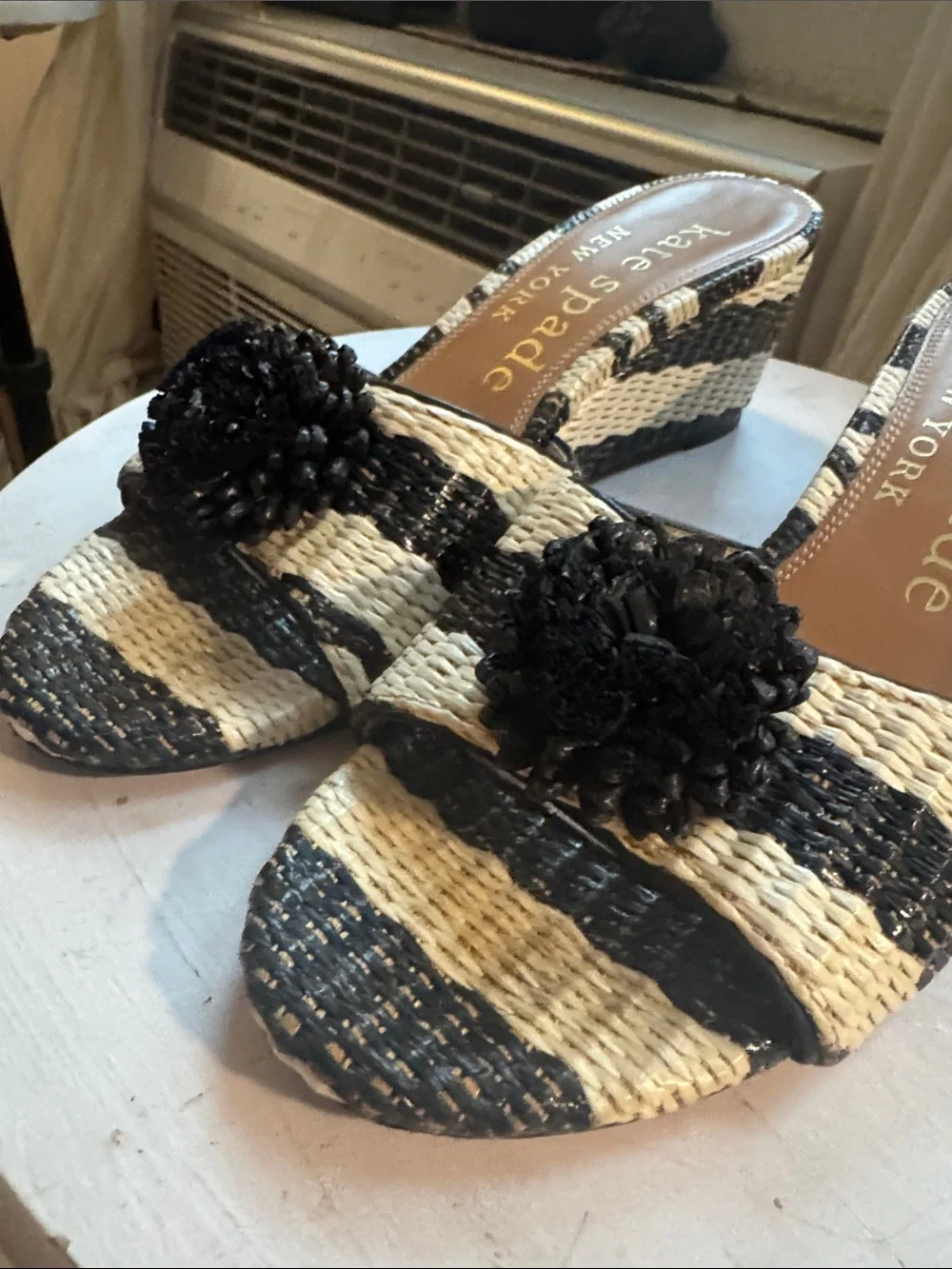 kate spade Black and Natural Striped Wedge Slides with Pom Pom Detail